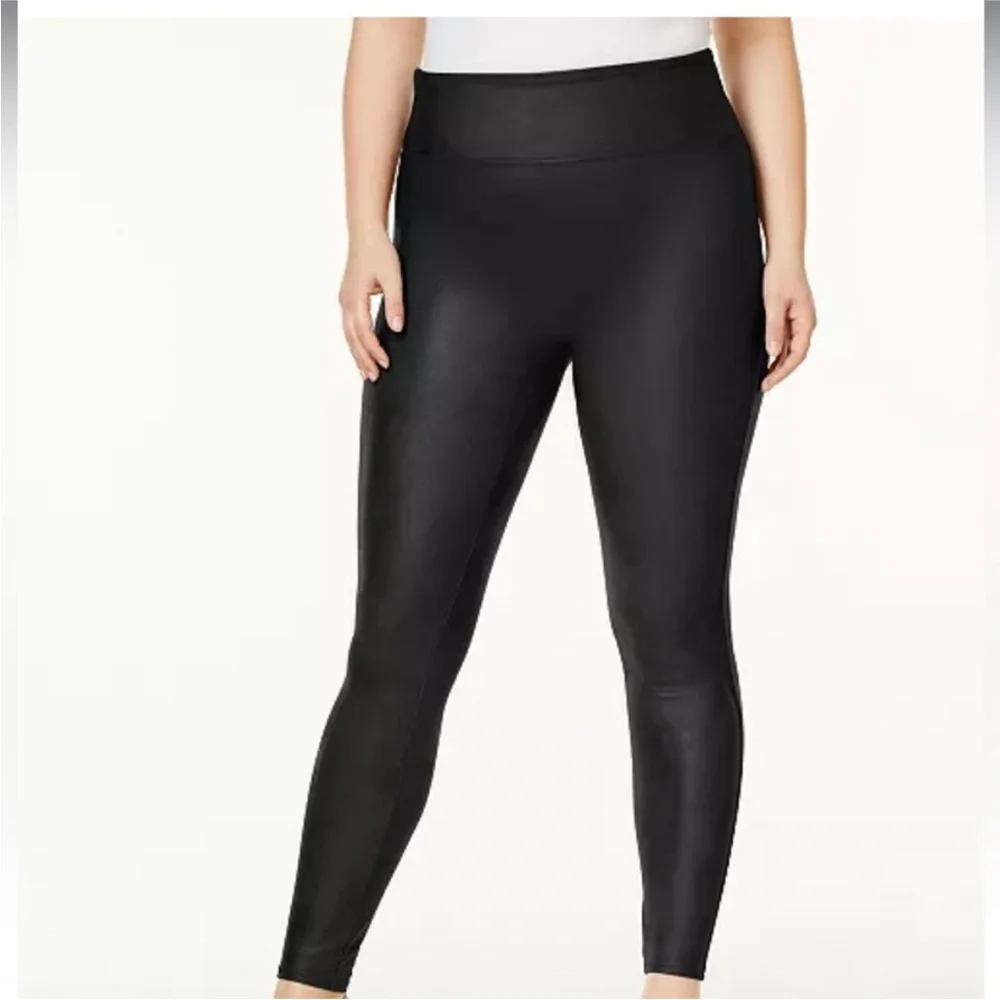 Spanx Women’s Black Faux Leather Leggings in a size Small.